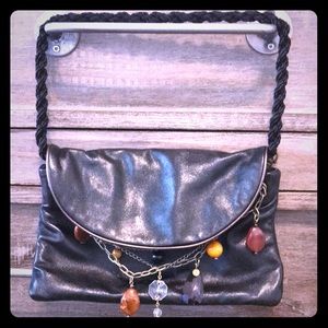 Beautiful leather black statement bag with jewels